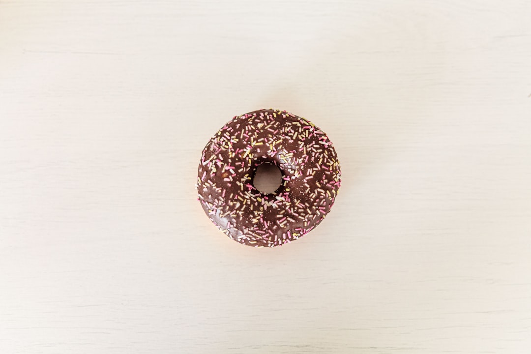 Classic glazed doughnut with shiny sugar glaze