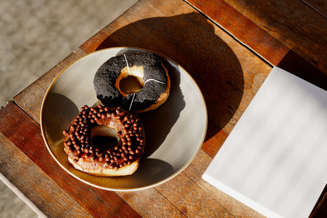 Customer sharing Doughnut Shack box